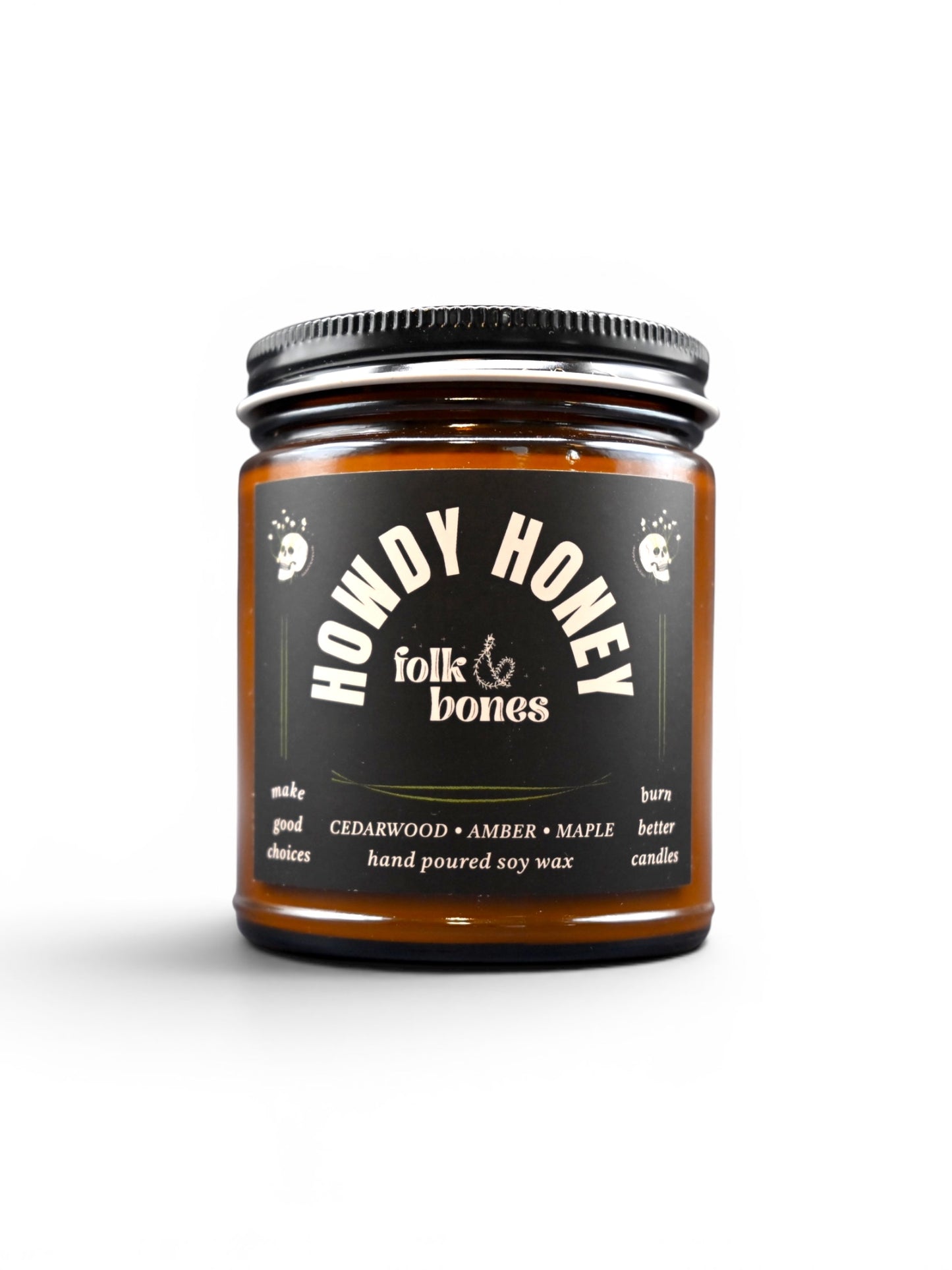 Folk and Bones Howdy Honey 8 oz soy candle with a rustic jar and a lit wick, showcasing warm, inviting candlelight.