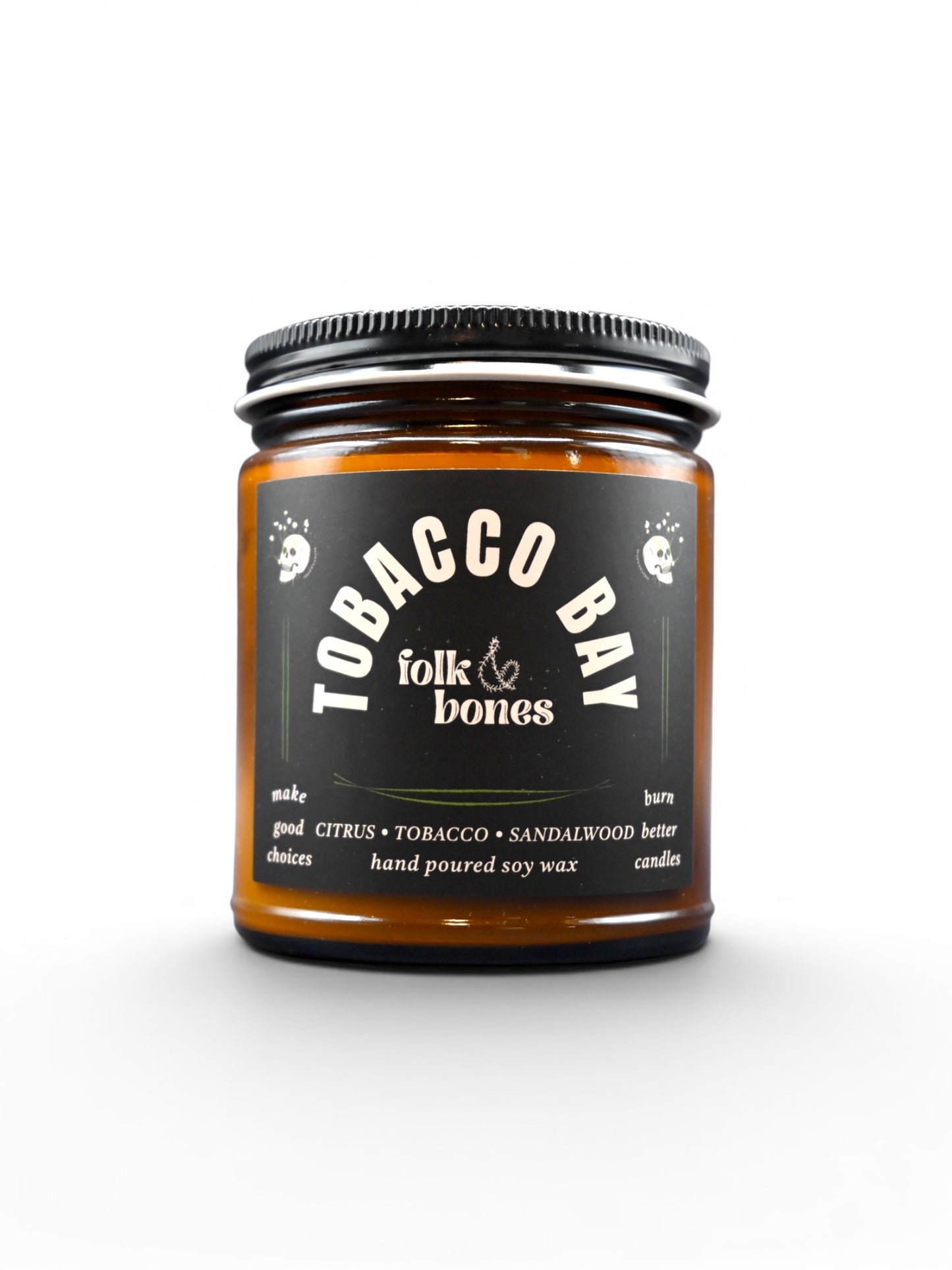 Folk and Bones Tobacco Bay 8 oz soy candle with rustic jar and wooden lid, featuring a warm, inviting candle design.