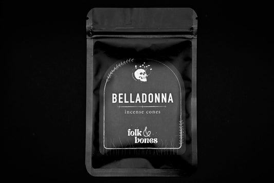 Folk and Bones Belladonna incense cones in a box, showcasing the candle packaging with dark, elegant design and branding.