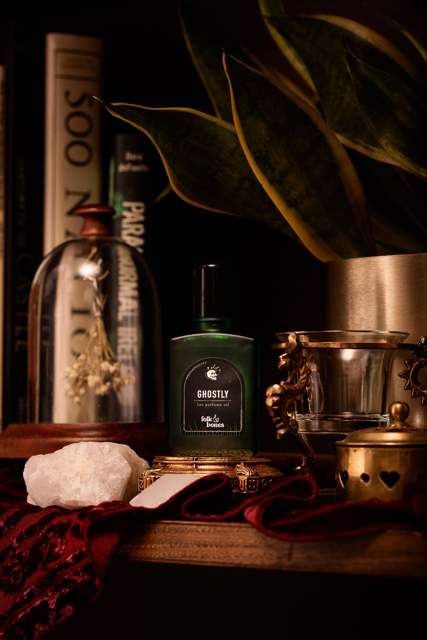 Folk and Bones Ghostly 1 oz perfume oil candle with dark, mysterious design and subtle ghostly branding visible.