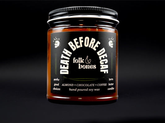 Folk and Bones Death Before Decaf soy candle in 8 oz jar, with black label and minimalist design, ready for home decor.