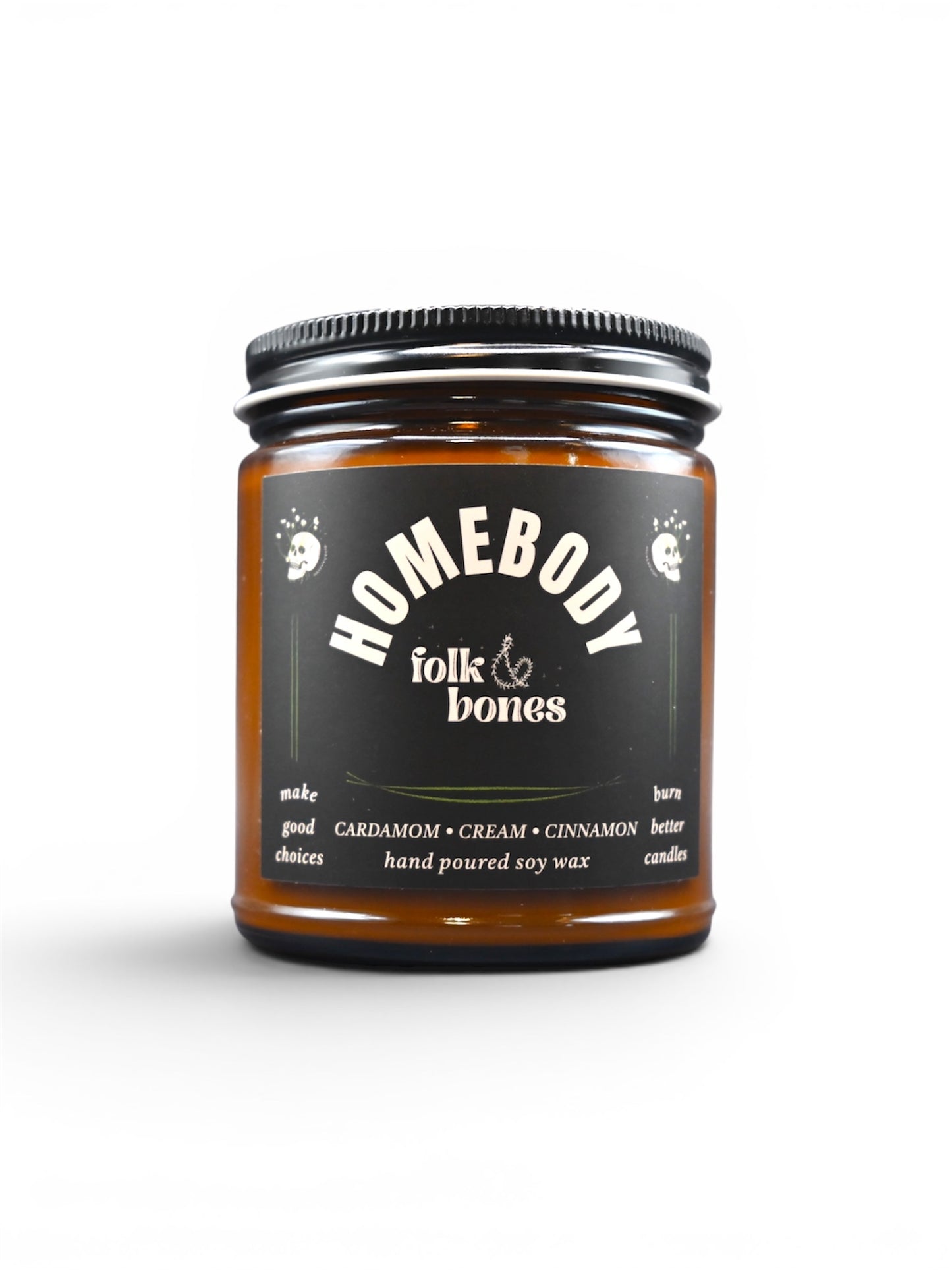 Folk and Bones Homebody 8 oz soy candle in a glass jar with a wooden lid, showcasing a cozy, minimalist design.