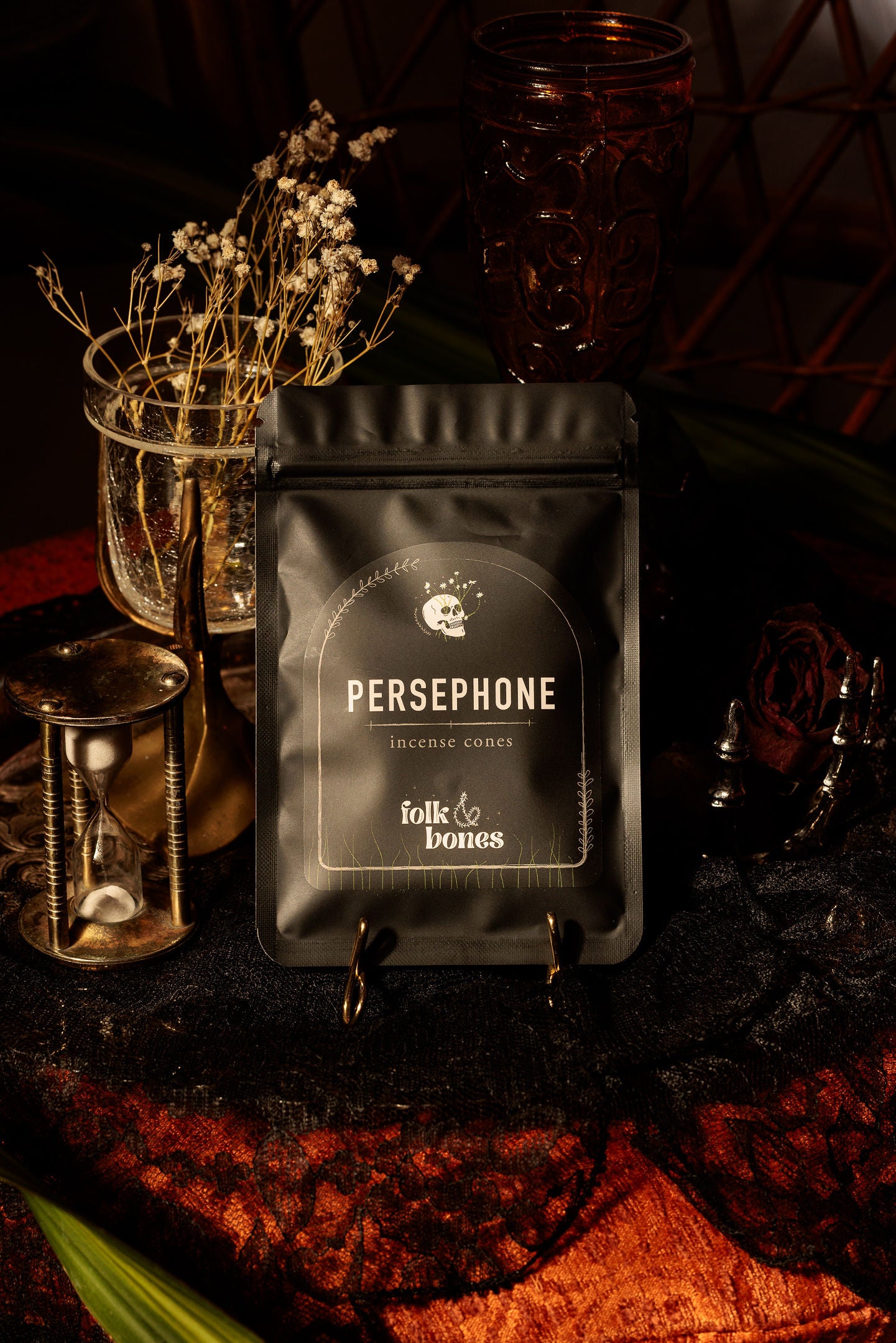 Folk and Bones Persephone incense cones in a decorative box, used for aromatic candle-burning and spiritual rituals.