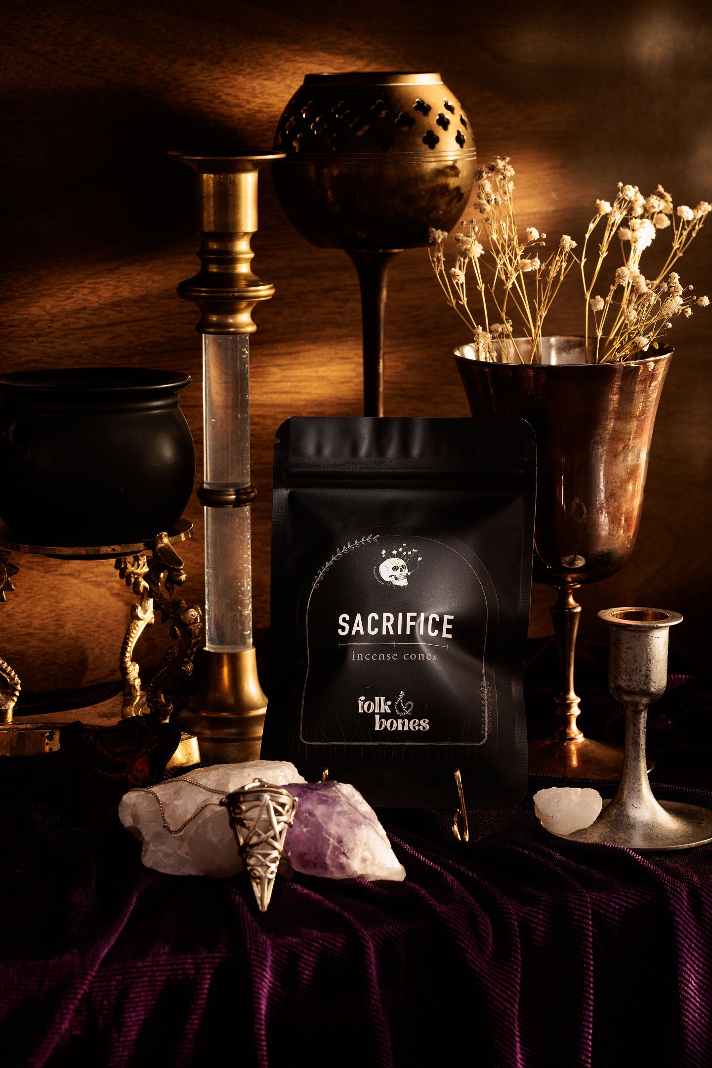 Folk and Bones Sacrifice incense cones in a box, with the cones arranged for burning, ideal for candle and incense enthusiasts.