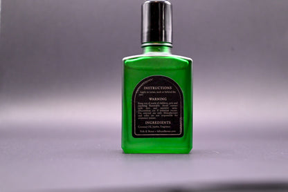 Folk and Bones Ghostly 1 oz perfume oil candles with ghostly-themed design in a glass container, featuring a dark, mysterious aesthetic.