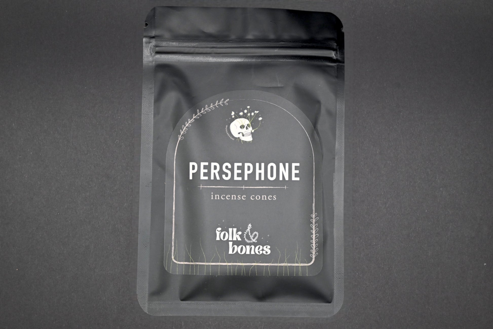 Folk and Bones Persephone incense cones in a box, scented candles for aromatic home fragrance, with a dark decorative design.