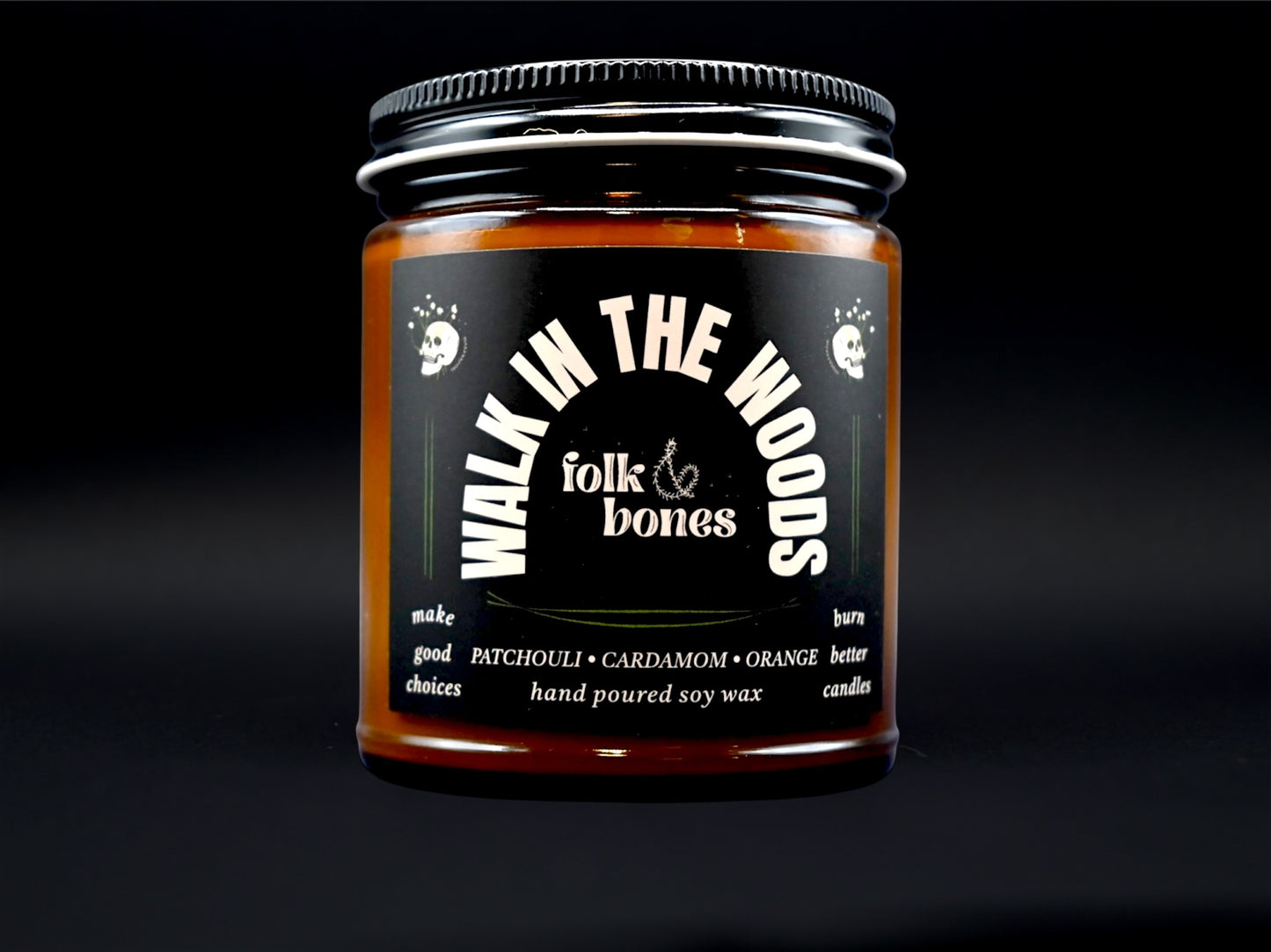 Folk and Bones Walk in the Woods 8 oz soy candle featuring a rustic jar with a nature-inspired label and wooden lid.