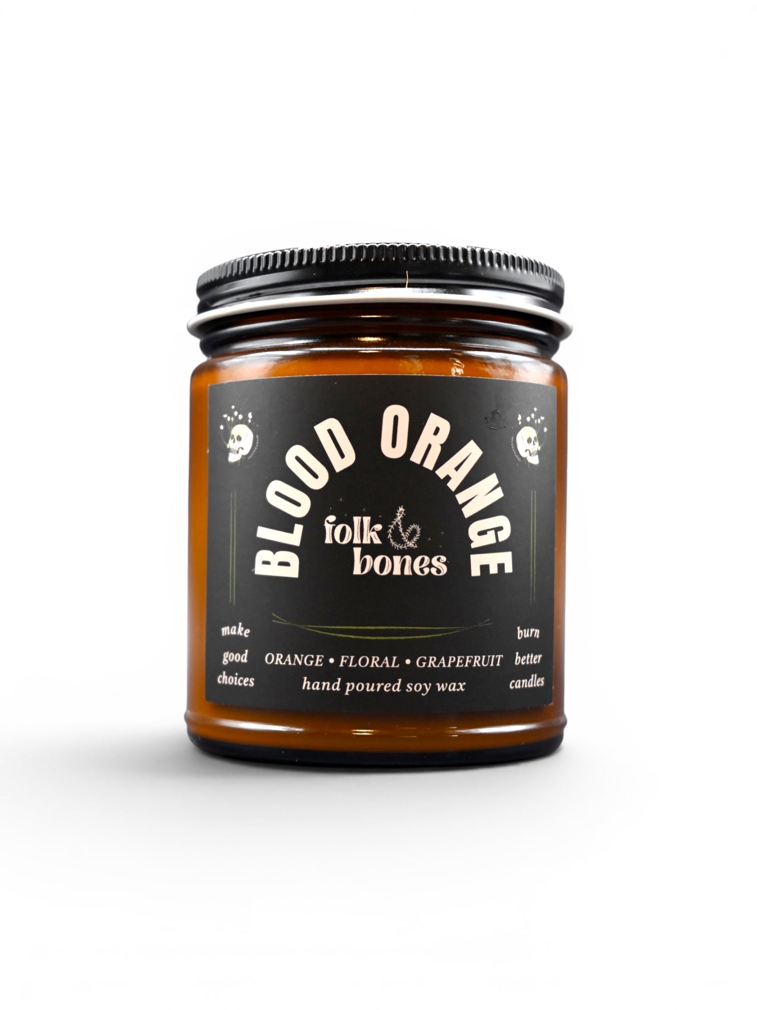 Folk and Bones Blood Orange soy candle in an 8 oz jar, featuring a vibrant orange hue and a cozy flame.