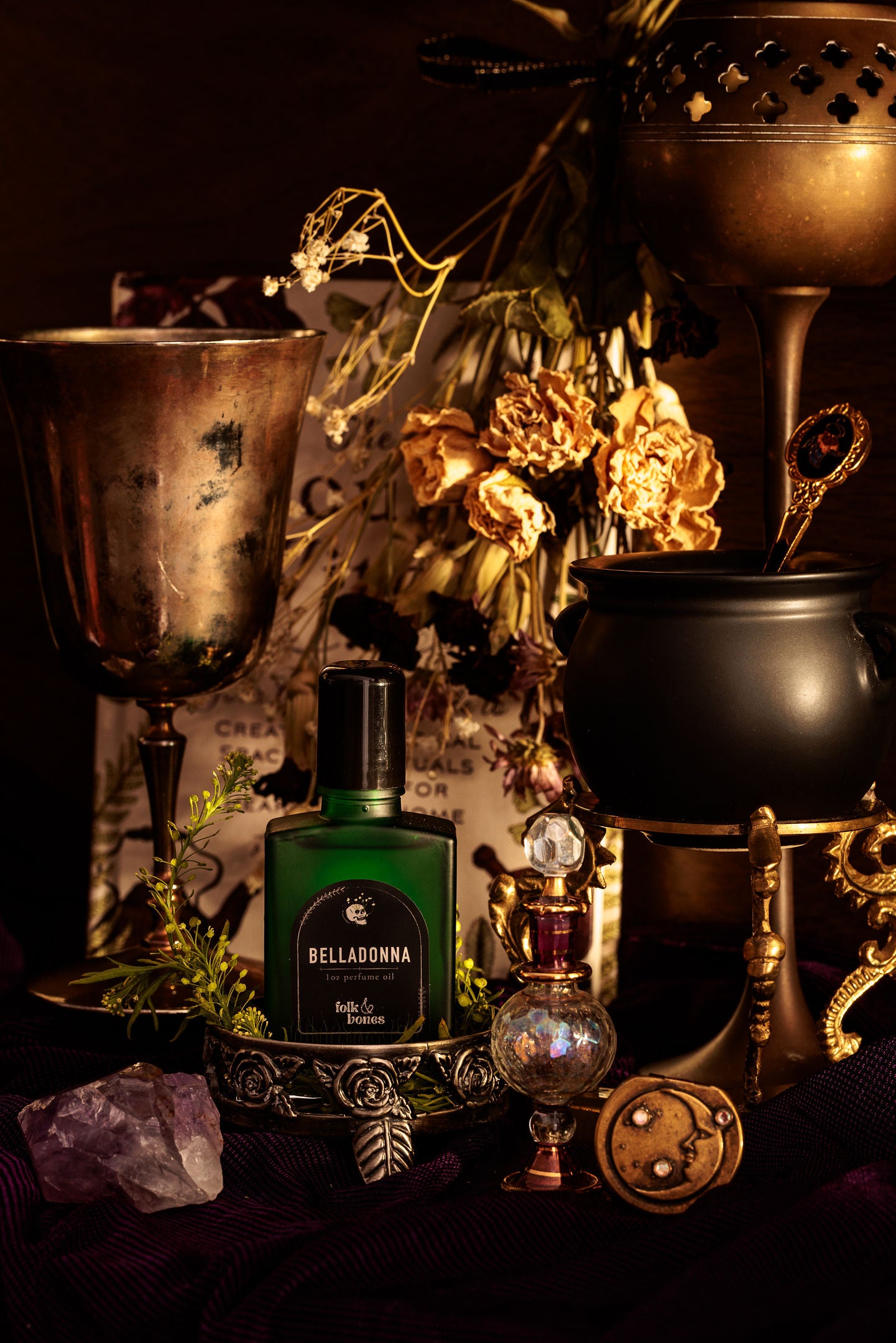 Folk and Bones Belladonna 1 oz perfume oil bottle with elegant label, displayed on a neutral background.