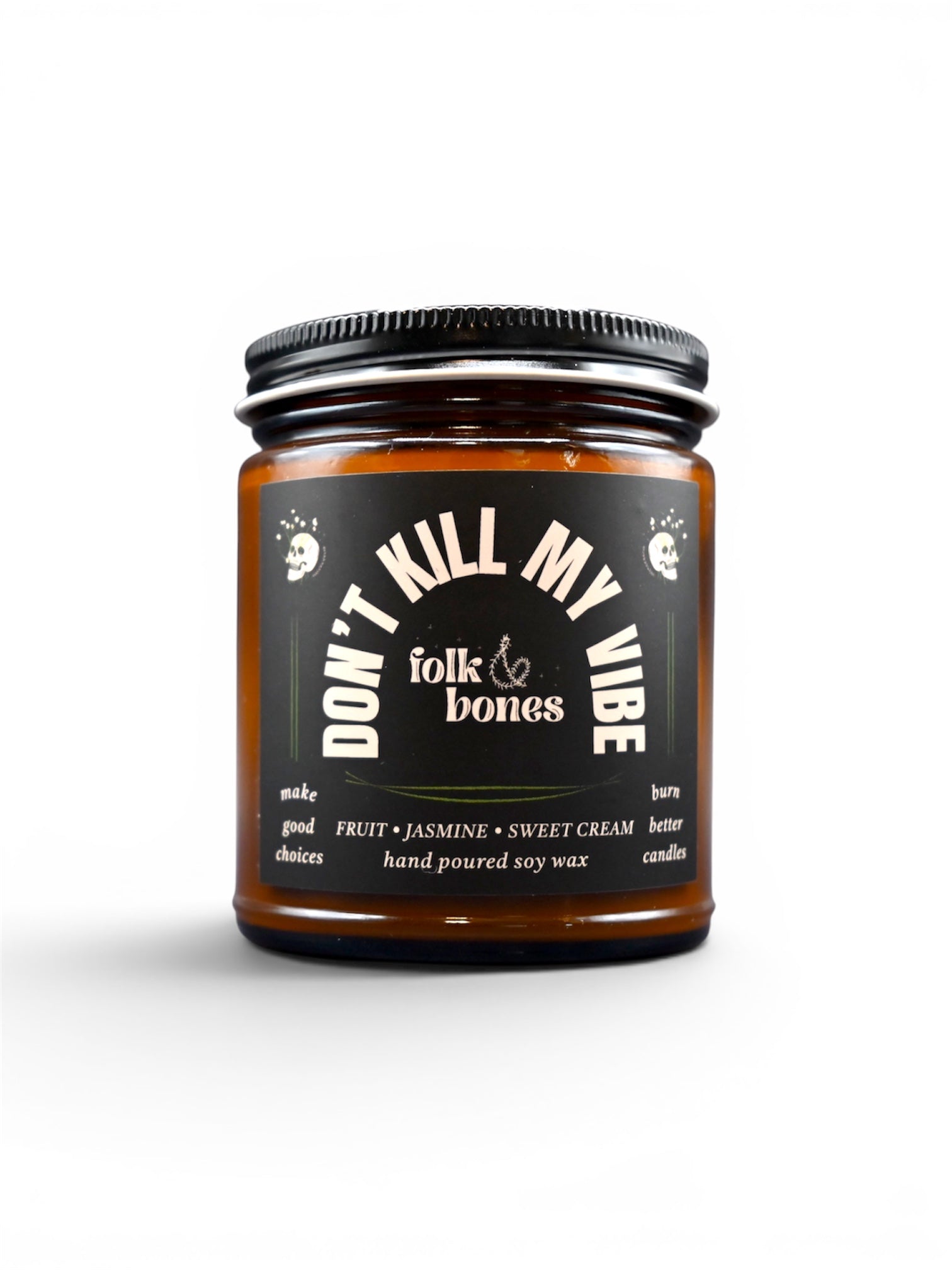 Folk and Bones Don't Kill My Vibe 8 oz soy candle in a glass jar with a white label and black lid, ready to burn.