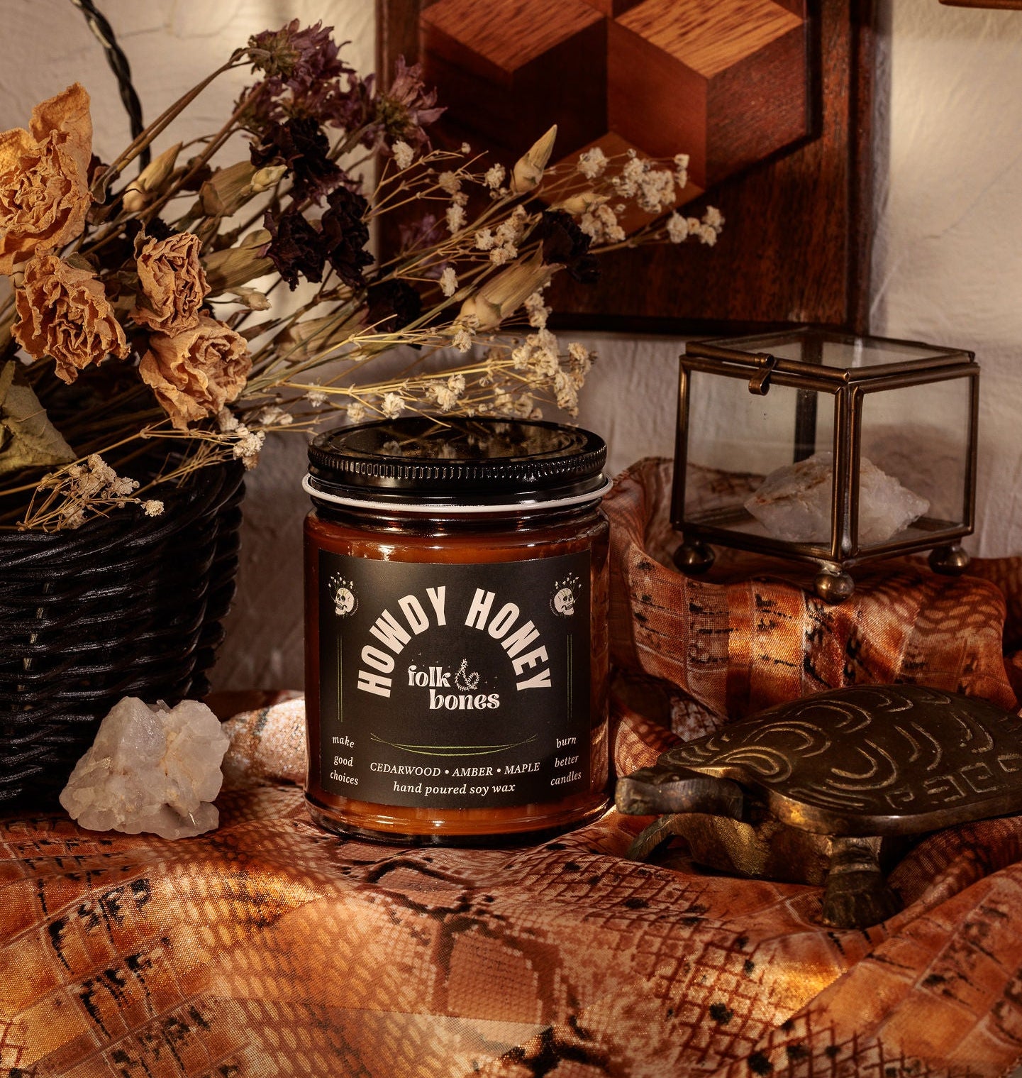 Folk and Bones Howdy Honey 8 oz soy candle in a glass jar, showcasing the candle with a warm, inviting glow.